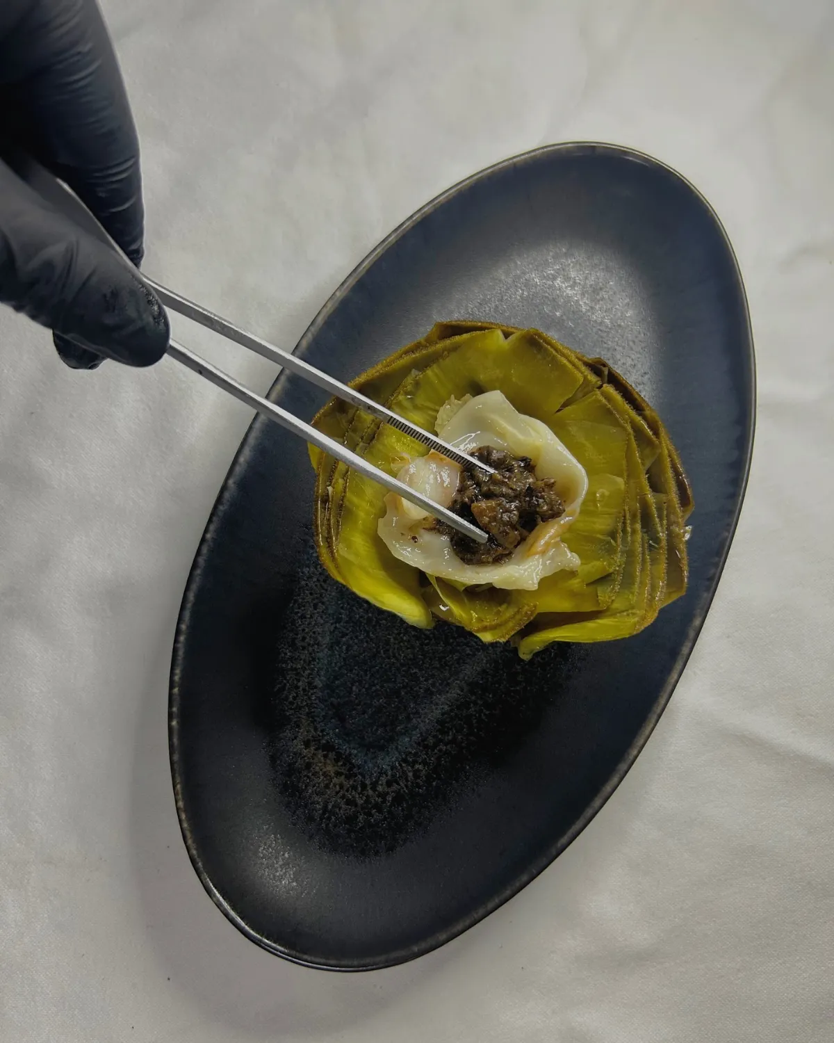 Confit artichoke with black truffle at La Estrella 1924