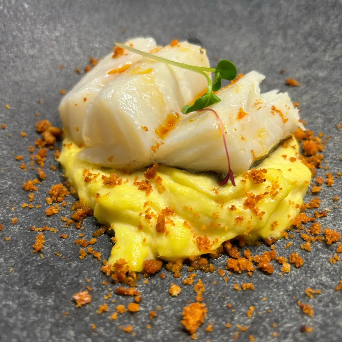 Cod on potato parmentier with a crunchy topping, at La Estrella 1924