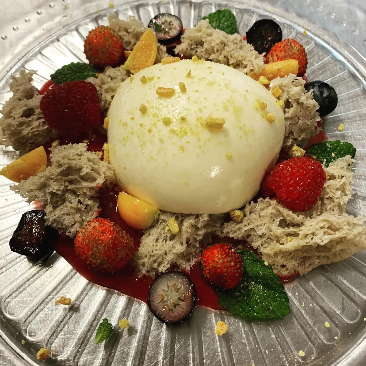 Burrata with wild strawberries and red berries at La Estrella 1924