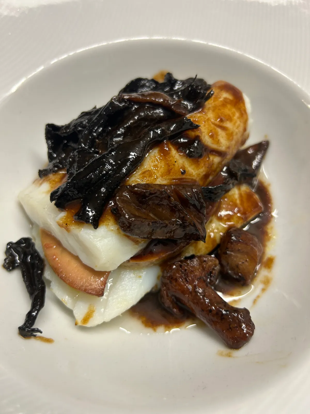 White fish with seasonal mushrooms and sauce